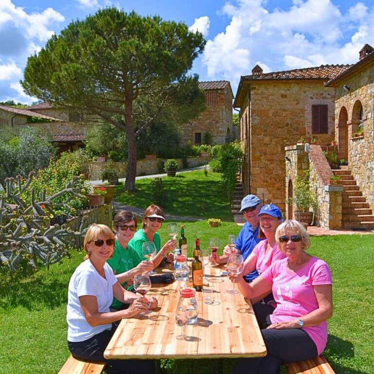 Farmhouse lunch in Tuscany with local wine and Walk About Italy guests